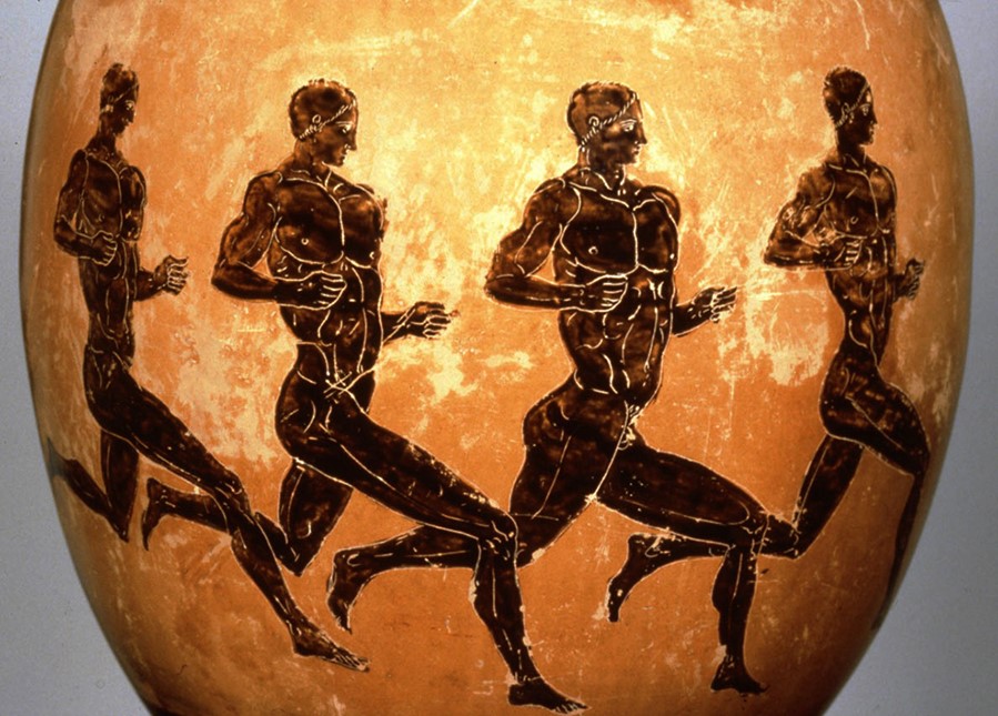 These athletes, on a trophy from Athens, represent longer-distance runners who have settled into their stride. Most sprinters are shown in Greek art with their arms pumping wildly. Panathenaic amphora with lid (detail), about 320 B.C., attributed to the Nichomachos Group. Terracotta, 44 1/8 in. high. The J. Paul Getty Museum, 76.AE.5. Image courtesy of Perseus Digital Library
