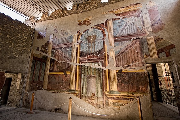 These beautiful frescoes in the Oecus (main living room) at Villa di Poppaea feature trompe-l’oeil windows, doors, and painted columns.