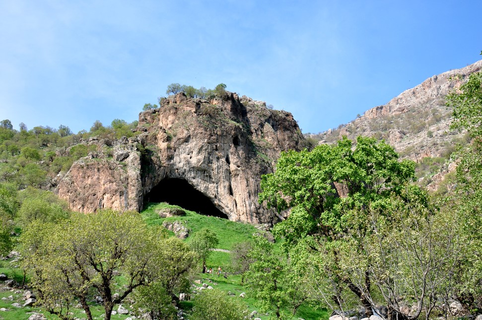 The cave of Shanidar lies in the Bradost mountain, part of Zagros Mountain range in Erbil, Kurdistan, Iraq. The site is located within in the valley of the Great Zab river. It was excavated from 1957–1961 CE by Ralph Solecki and his team from Columbia University and yielded the first adult Neanderthal skeletons in Iraq, dating from 60–80,000 years BCE.