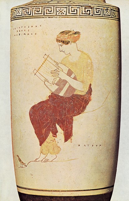 An Athenian white-ground lekythos by the Achilles Painter showing a Muse seated on Mount Helicon. The inscription above praises the youth Axiopeithes. About 440 BC . Height of figure frieze about 17 cm. (Munich, von Schoen)