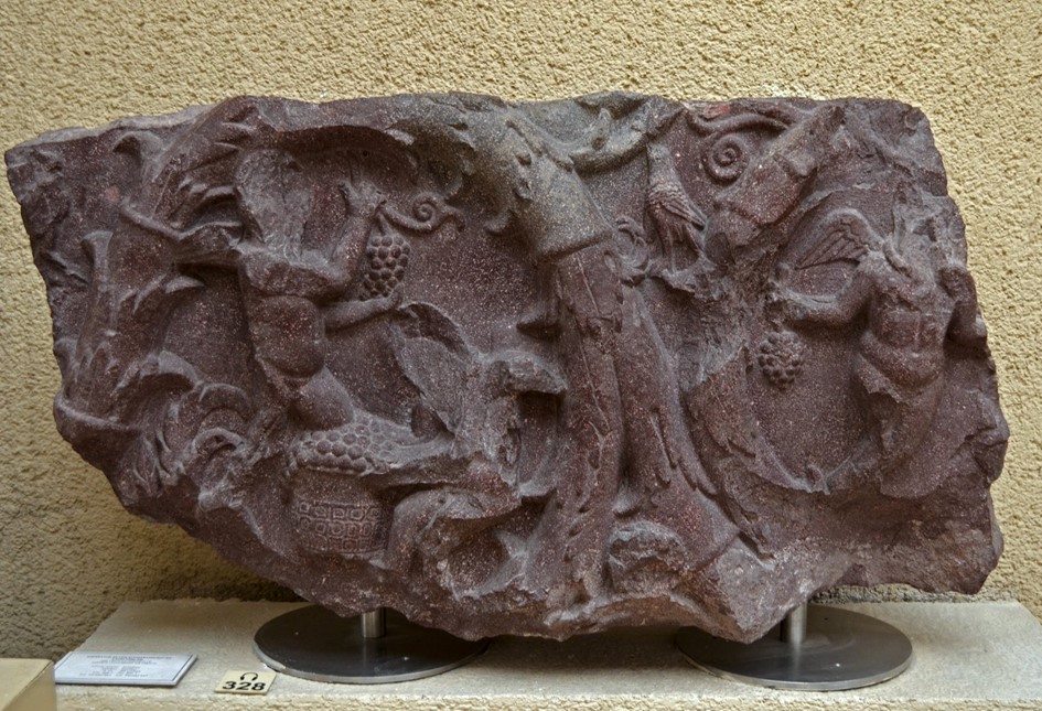 A fragment of a porphyry sarcophagus from the Holy Apostles in Constantinople is remarkably similar to a sarcophagus in Rome. The sarcophagus fragment, now at Istanbul Archaeological Museums, is often associated with Constantine, while the sarcophagus at Pio Clementino Museum in the Vatican Museums was found at Santa Costanza and generally believed to belong to Constantina, the daughter of Constantine. www.thebyzantinelegacy.com/constantia-sarcophagus