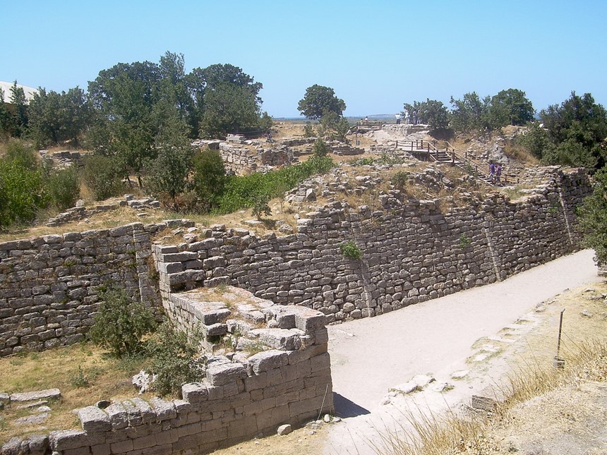East tower and cul-de-sac wall before the east gate of Troy VI, considered the floruit of Bronze Age Troy. The complex would have been surmounted and augmented by mud-brick structures.